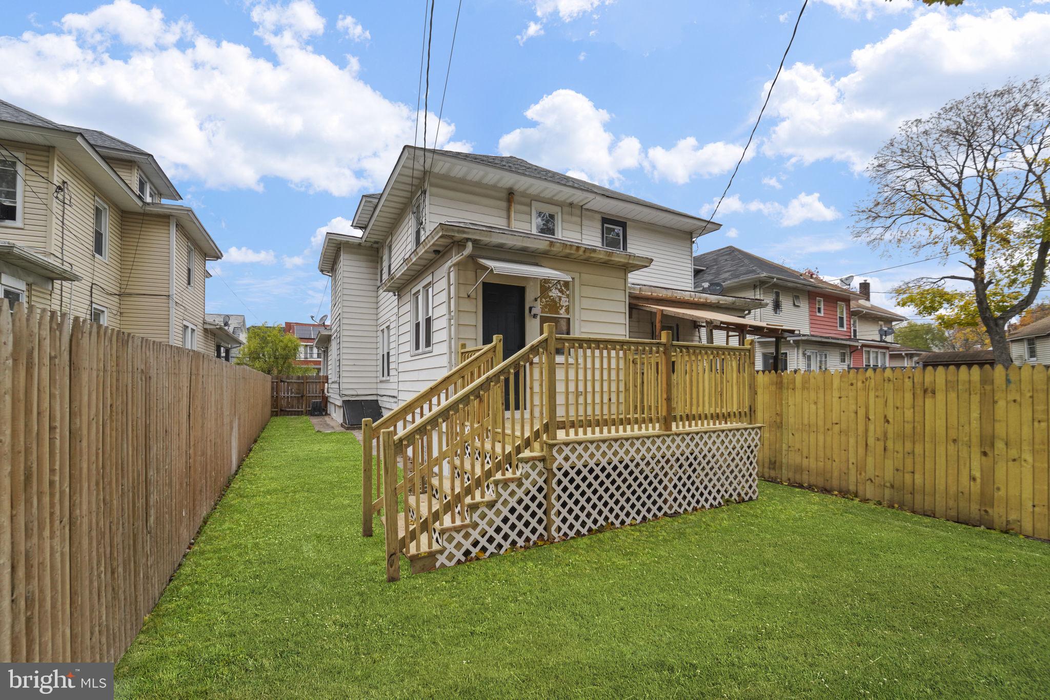 121 Parker Place Hamilton, NJ 08609 - Photo 34 of 37 a view of a house with a yard