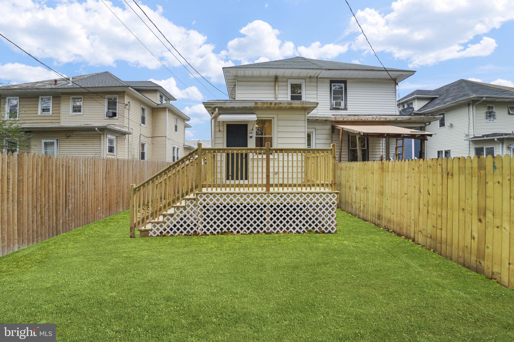 121 Parker Place Hamilton, NJ 08609 - Photo 35 of 37 a front view of a house with a garden