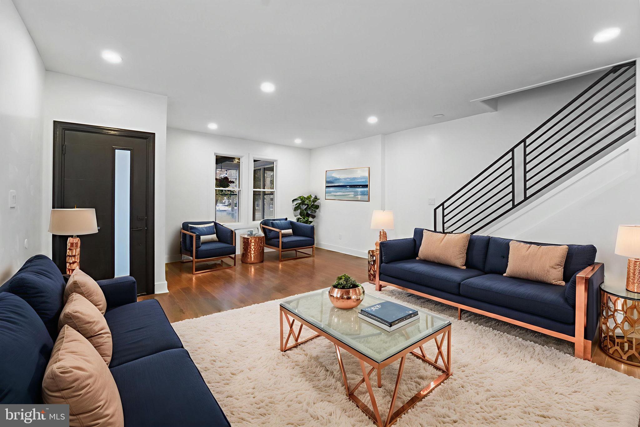 121 Parker Place Hamilton, NJ 08609 - Photo 4 of 37 a living room with furniture and wooden floor