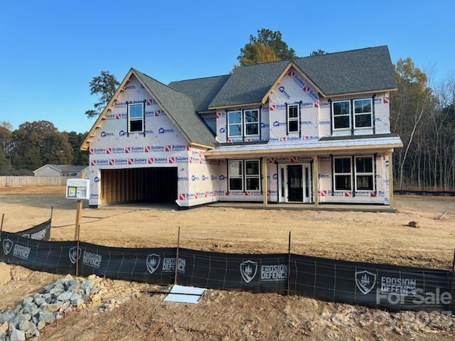 a front view of a house with swimming pool