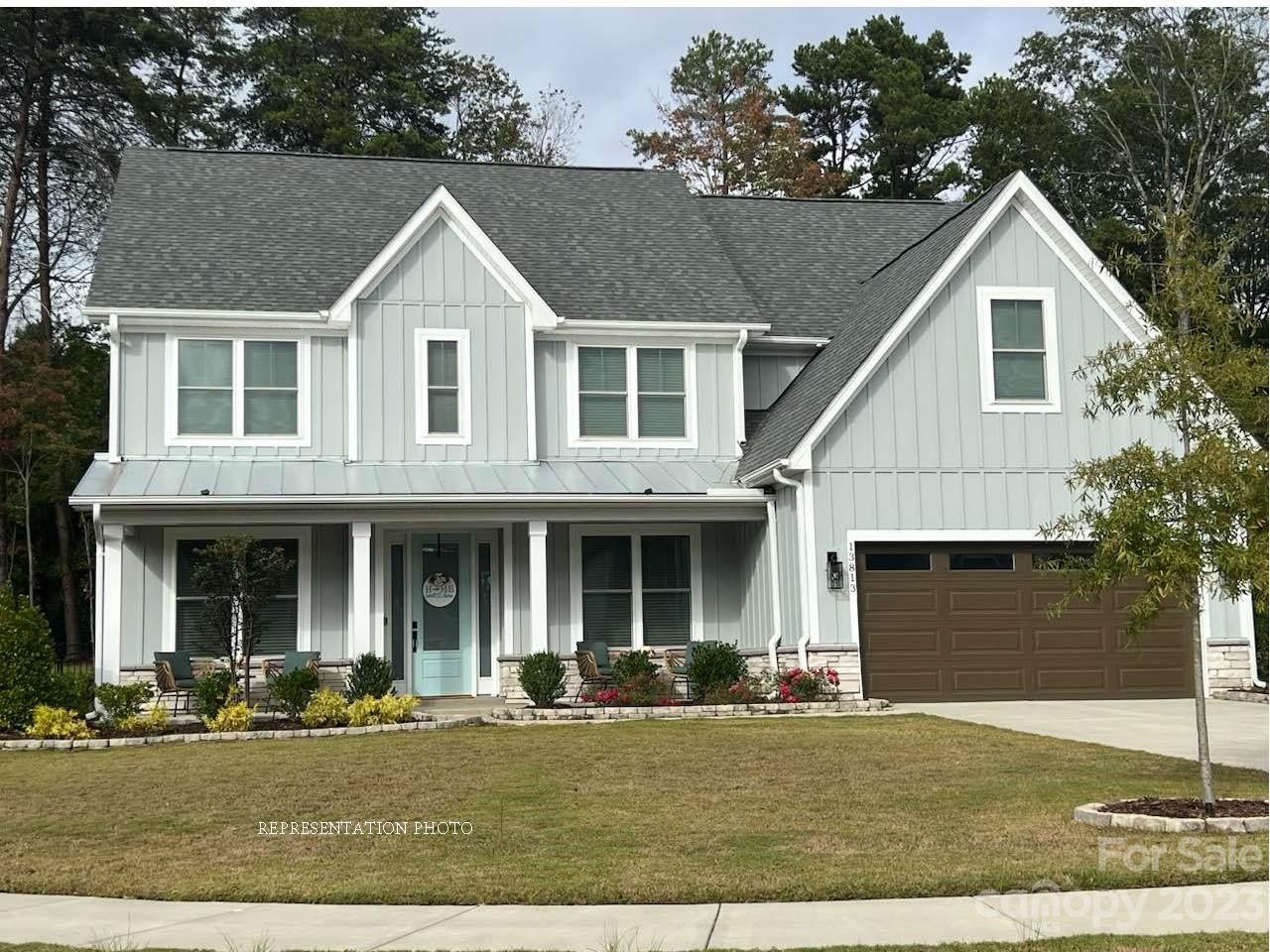 7218 Hambright Road Huntersville, NC 28078 - Photo 2 of 2 a view of a yard in front view of a house