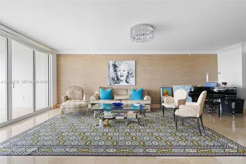 a living room with furniture and a rug