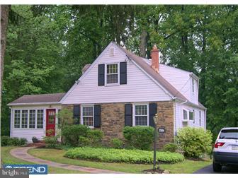 2584 High Road Huntingdon Valley, PA 19006 - Photo 1 of 12 a front view of a house with yard and green space