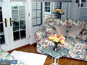 2584 High Road Huntingdon Valley, PA 19006 - Photo 3 of 12 a view of living room with furniture and flowers