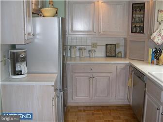 2584 High Road Huntingdon Valley, PA 19006 - Photo 5 of 12 a kitchen with white cabinets and sink