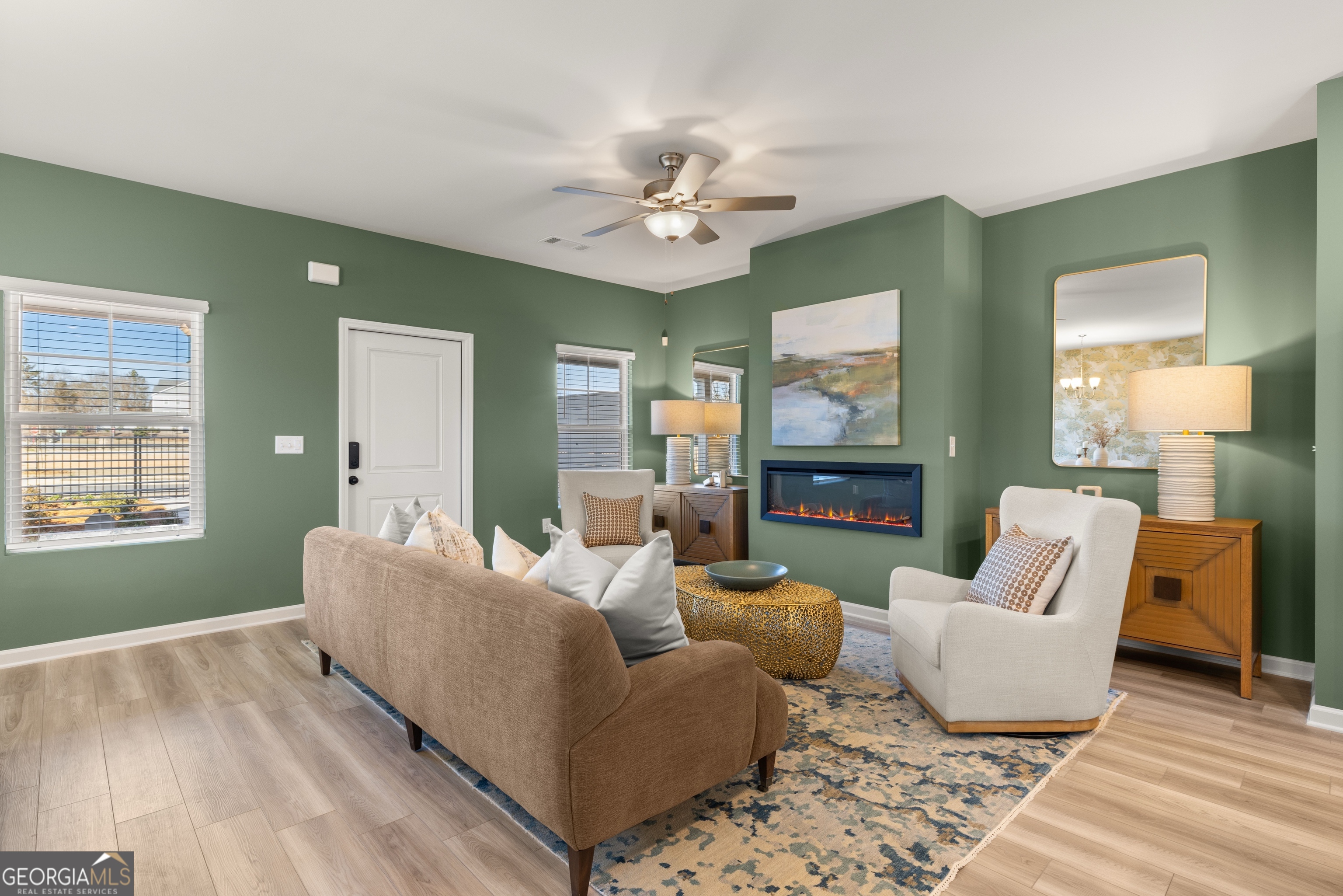 3261 Lake Carlton Road, Unit 24 Loganville, GA 30052 - Photo 13 of 33 a living room with furniture and a fireplace