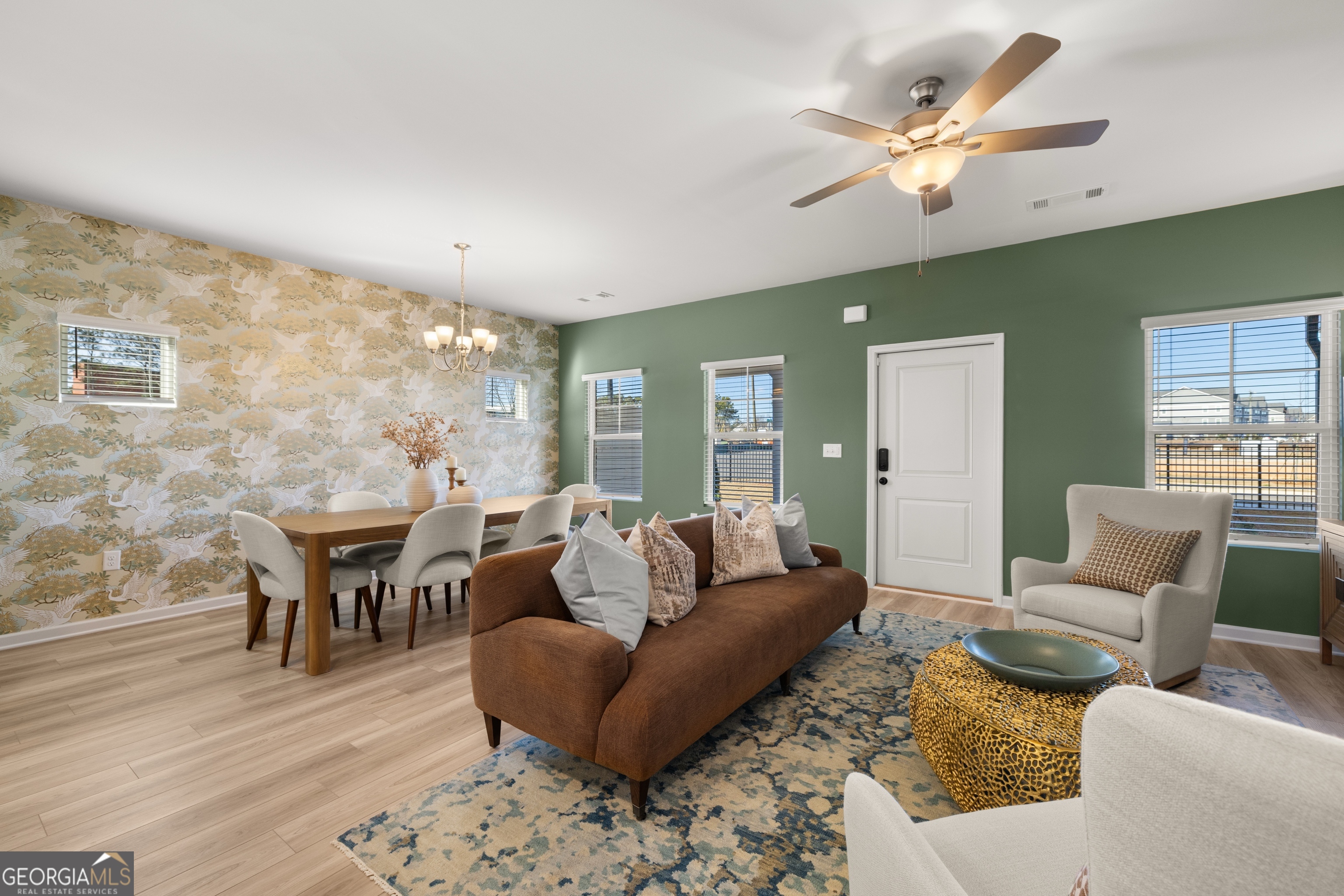 3261 Lake Carlton Road, Unit 24 Loganville, GA 30052 - Photo 15 of 33 a living room with furniture and wooden floor