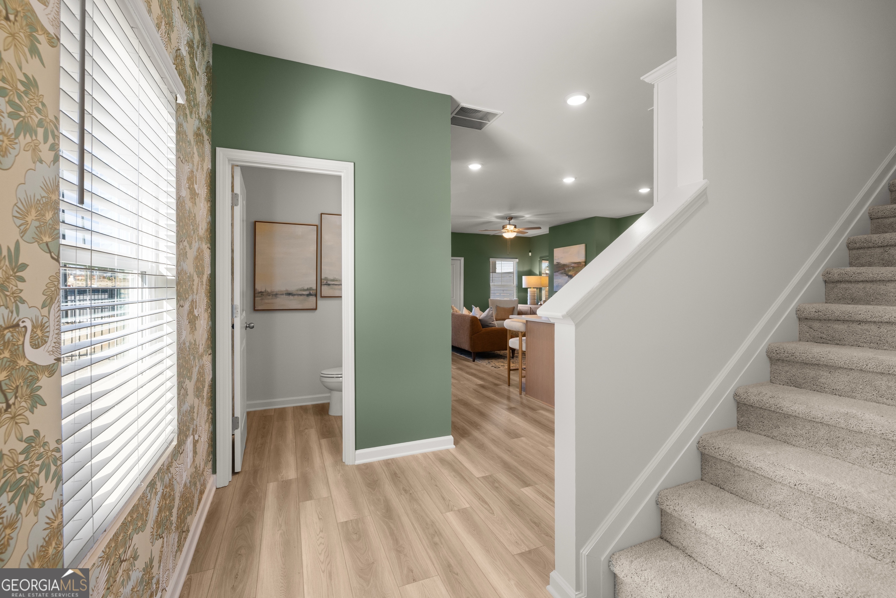 3261 Lake Carlton Road, Unit 24 Loganville, GA 30052 - Photo 16 of 33 a view of entryway and hall with wooden floor