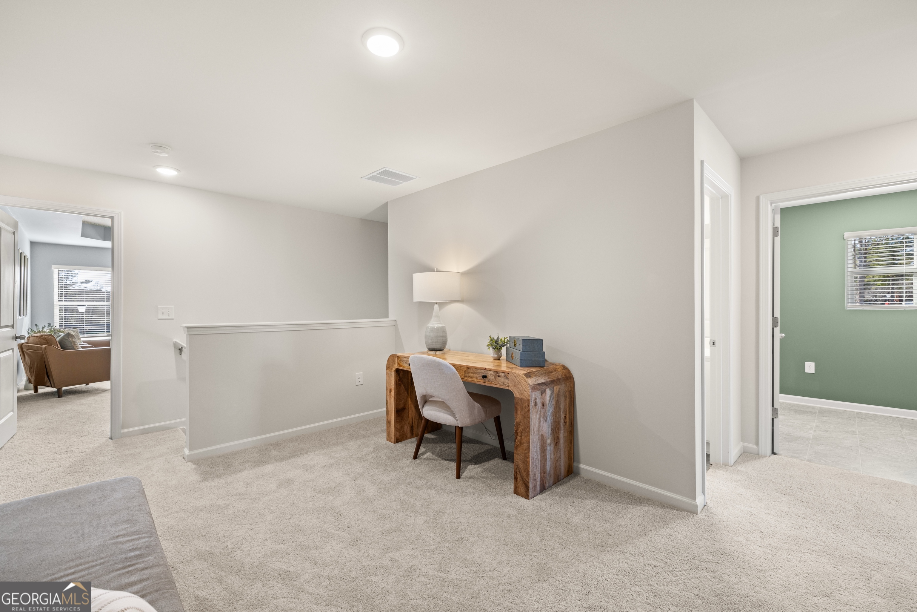 3261 Lake Carlton Road, Unit 24 Loganville, GA 30052 - Photo 20 of 33 a view of a livingroom with furniture and storage