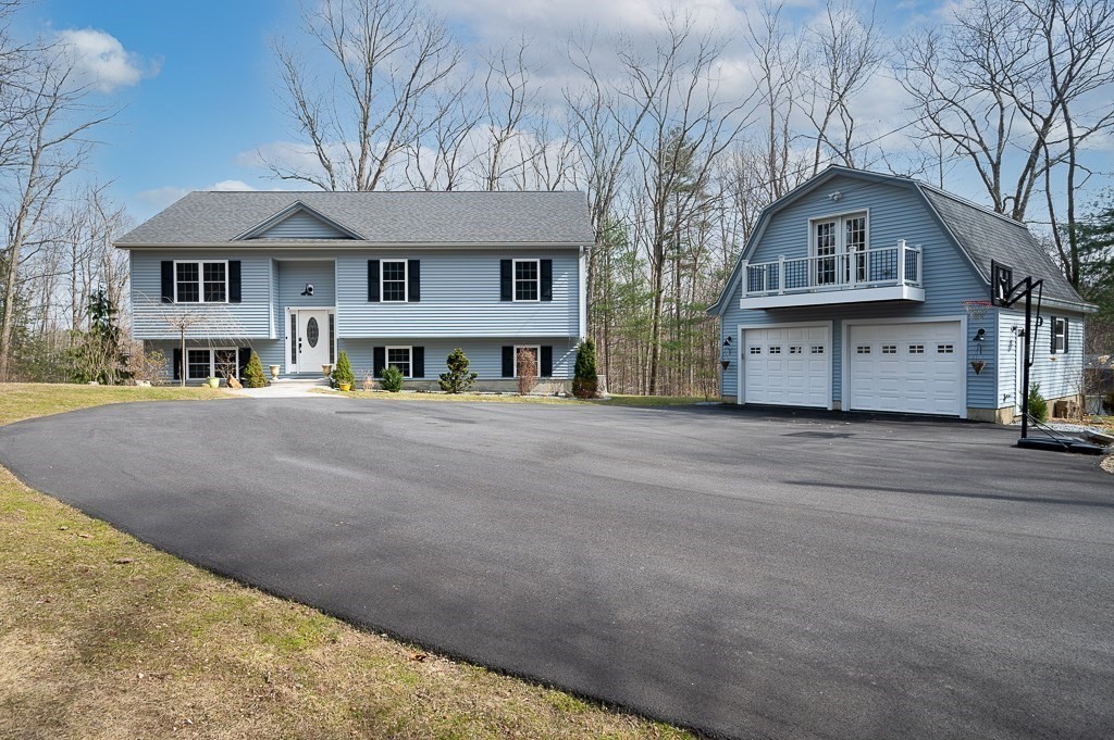 117 Shepard Road Sturbridge, MA 01566 - Photo 2 of 38 front view of a house with a street