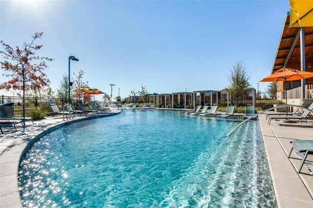 a view of a swimming pool with an ocean