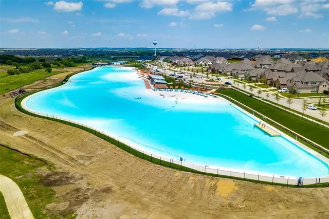 a view of playground with a slide and swing
