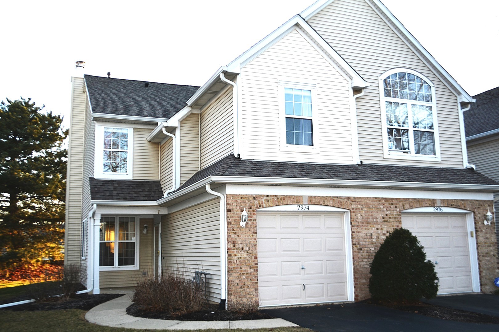 2974 Waters Edge Circle Aurora, IL 60504 - Photo 1 of 13 a front view of a house