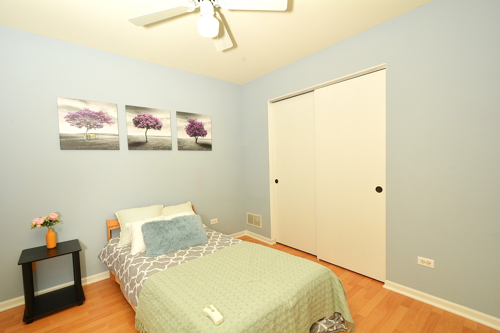 2974 Waters Edge Circle Aurora, IL 60504 - Photo 11 of 13 a bedroom with a bed and a couch