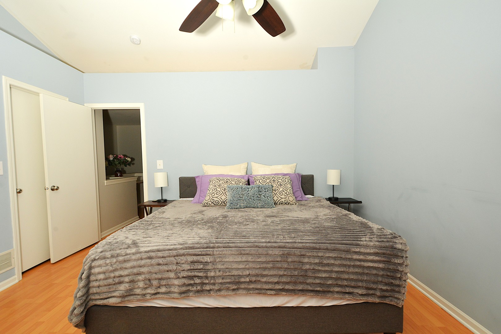2974 Waters Edge Circle Aurora, IL 60504 - Photo 8 of 13 a bedroom with a bed and night stand