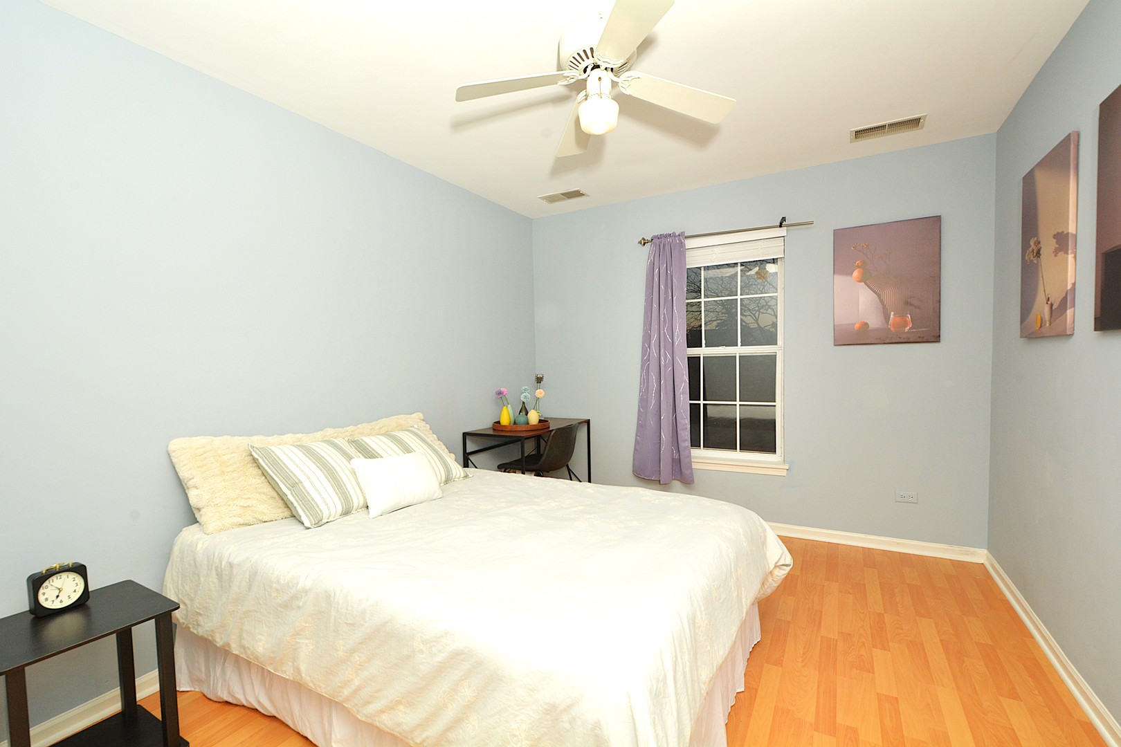 2974 Waters Edge Circle Aurora, IL 60504 - Photo 10 of 13 a bedroom with a bed and a window