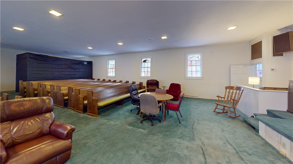 415 Church Street Pendleton, SC 29670 - Photo 7 of 35 A versatile open-concept space featuring bright window accents and recessed lighting.