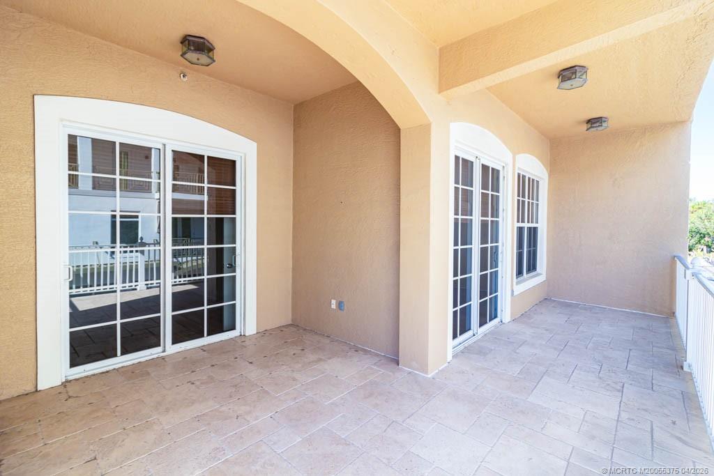 47 Southwest Osceola Street, Unit UN206 Stuart, FL 34994 - Photo 24 of 43 an empty room with windows