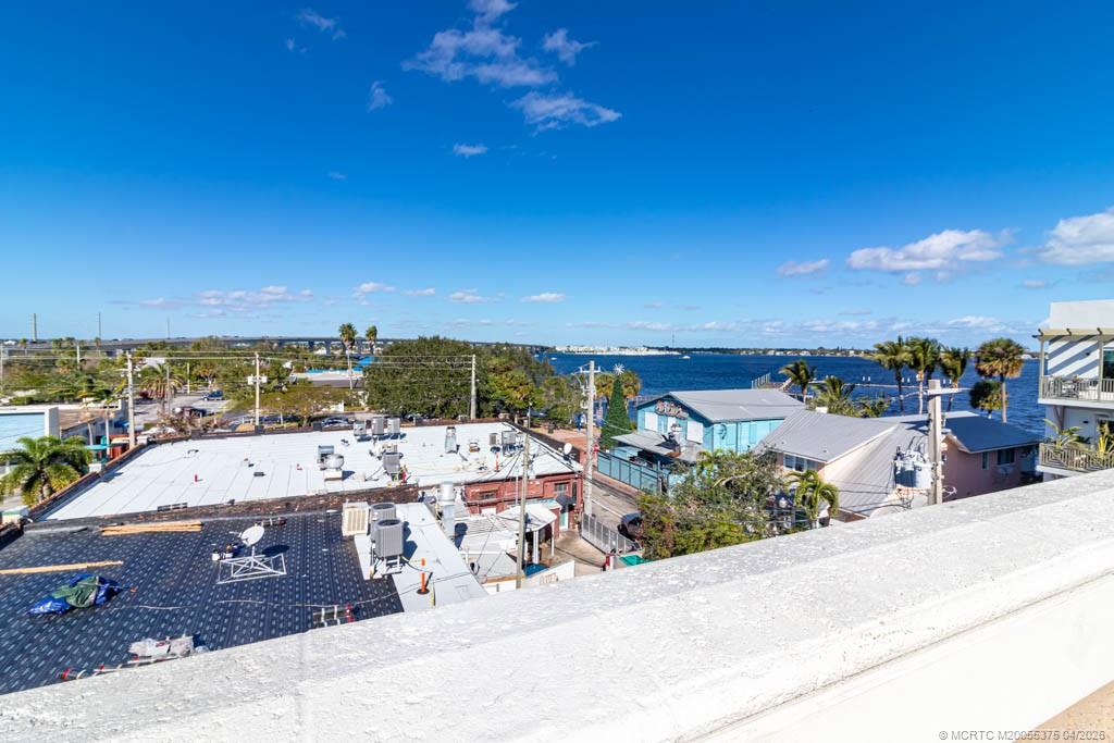 47 Southwest Osceola Street, Unit UN206 Stuart, FL 34994 - Photo 28 of 43 a view of a terrace with city view