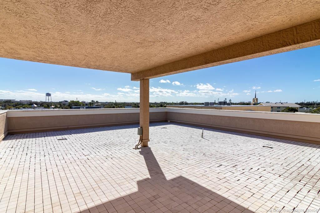 47 Southwest Osceola Street, Unit UN206 Stuart, FL 34994 - Photo 30 of 43 a view of a terrace