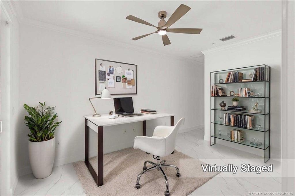 47 Southwest Osceola Street, Unit UN206 Stuart, FL 34994 - Photo 3 of 43 a view of a workspace with furniture