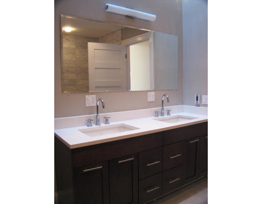 19 Roberts Road, Unit 19 Cambridge, MA 02138 - Photo 5 of 5 a bathroom with a sink and a mirror