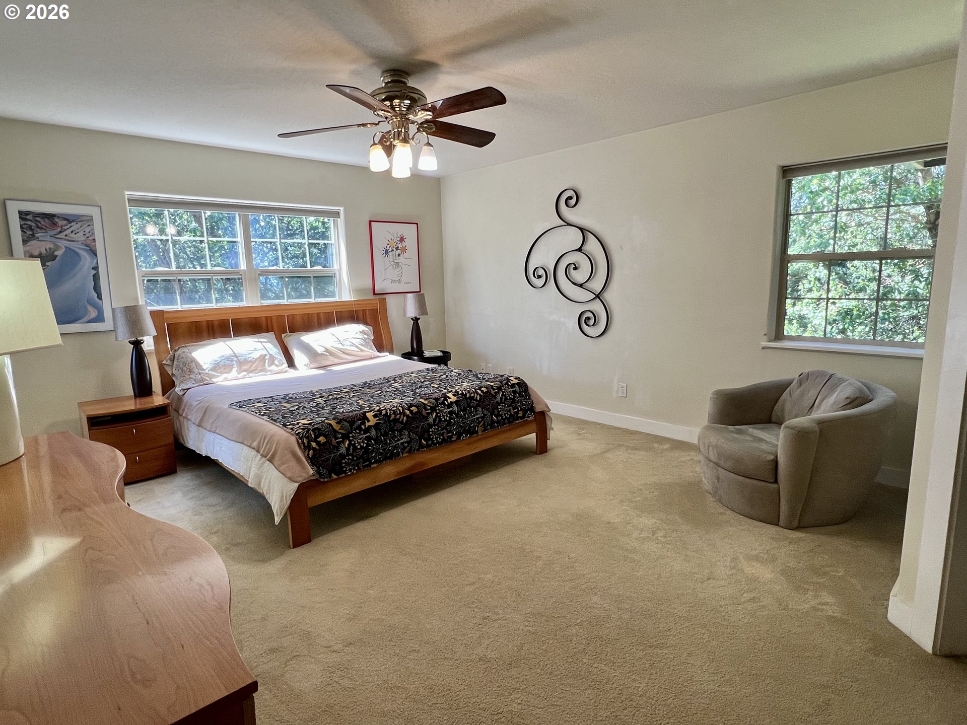 28544 Crow Road Eugene, OR 97402 - Photo 15 of 48 a bedroom with a bed and glass window