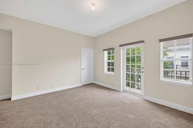 a spacious bathroom with bathtub