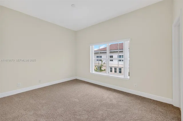 a bathroom with a sink a mirror and a shower