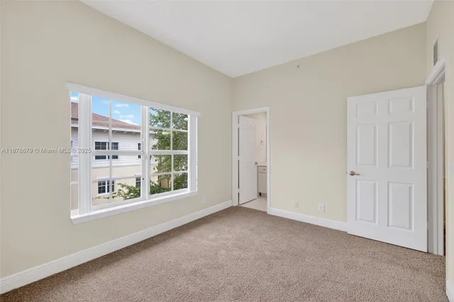 a bathroom with a sink a mirror and a shower