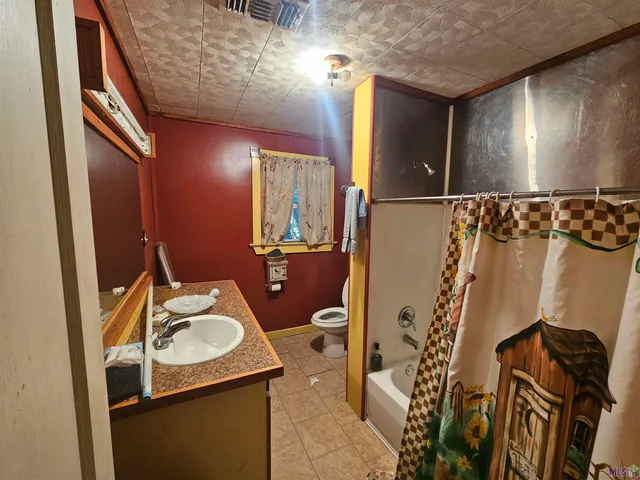 $130,000 | 16011 Peairs Road, Pride, LA 70770