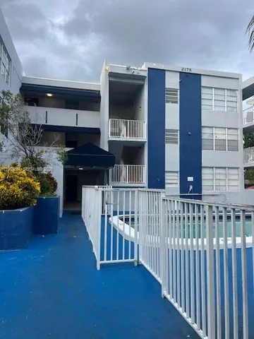 a view of a house with a porch
