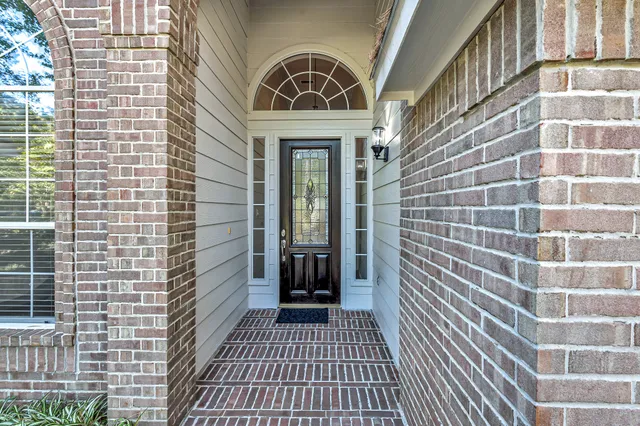 a view of a brick house with a door