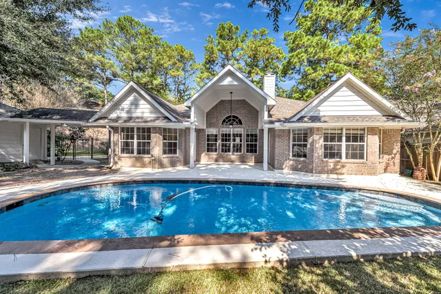a front view of a house with swimming pool