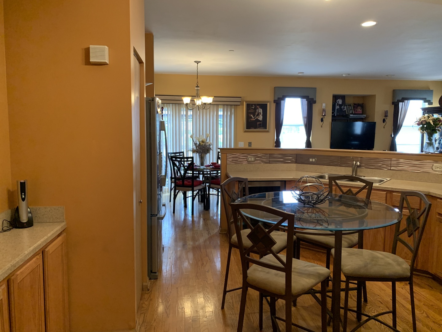 21211 Gray Hawk Drive Matteson, IL 60443 - Photo 11 of 36 a view of a dining room with furniture and wooden floor