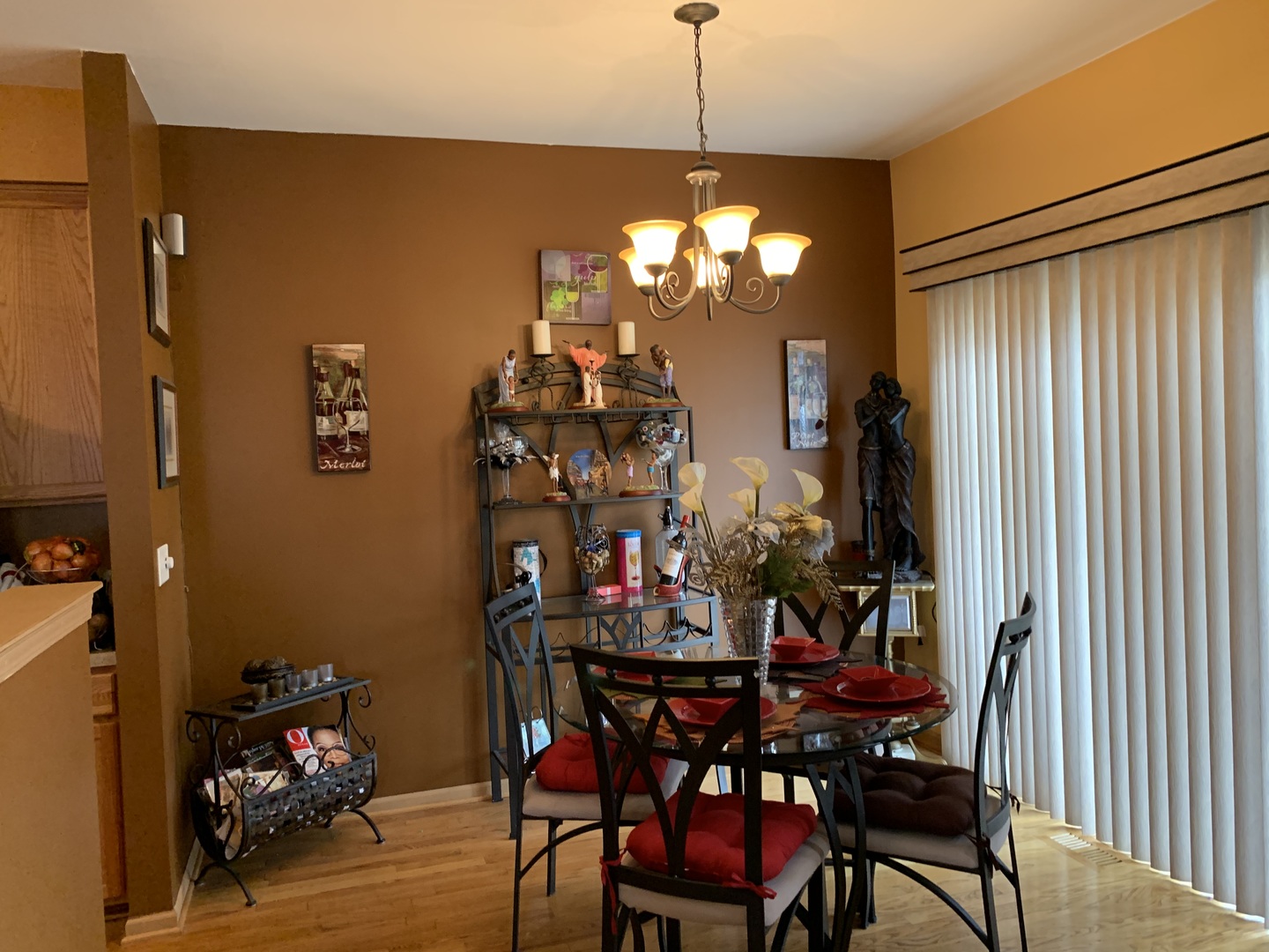 21211 Gray Hawk Drive Matteson, IL 60443 - Photo 14 of 36 a view of a dining room with furniture and chandelier