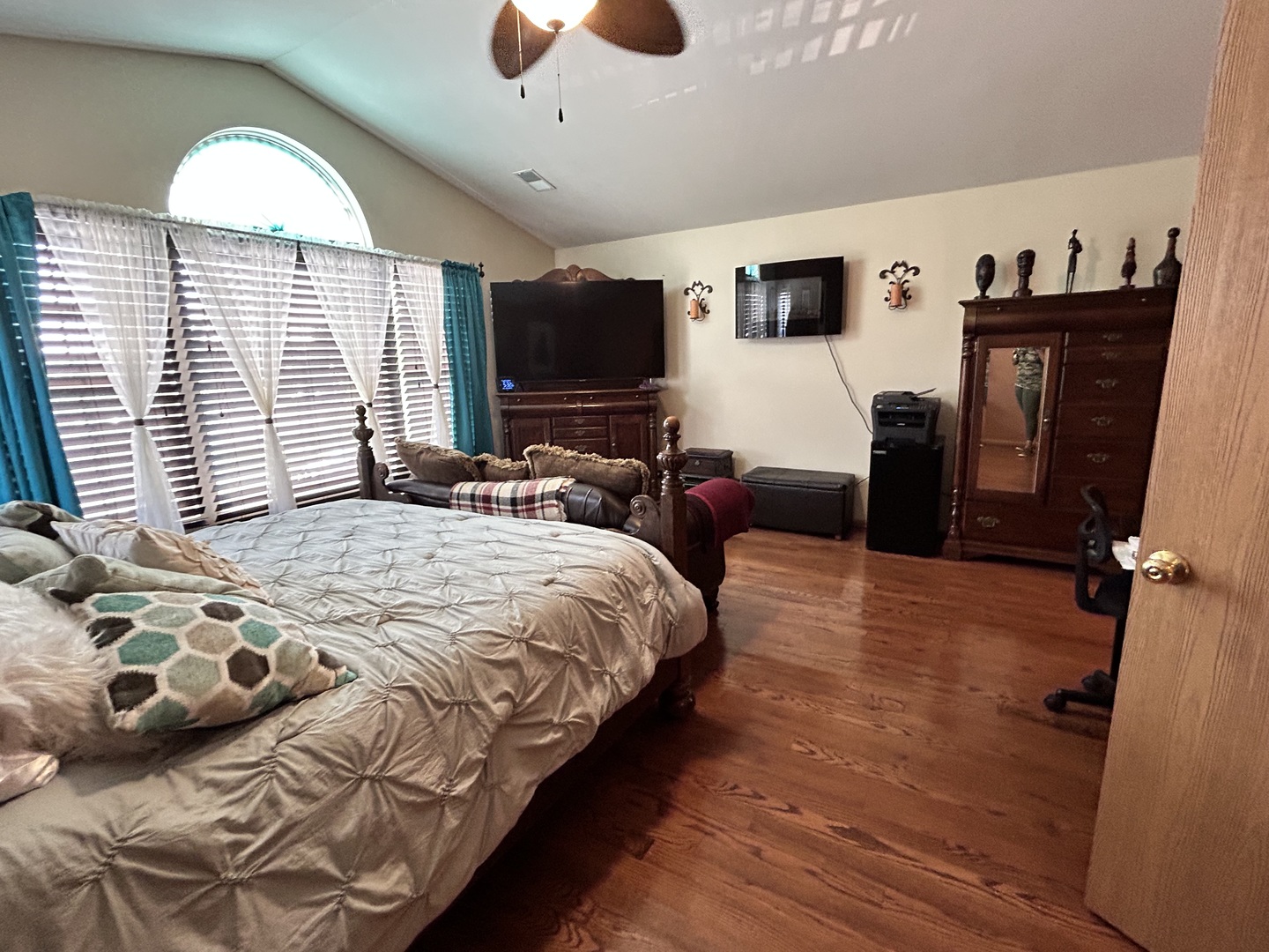 21211 Gray Hawk Drive Matteson, IL 60443 - Photo 23 of 36 a bedroom with a bed and a flat screen tv