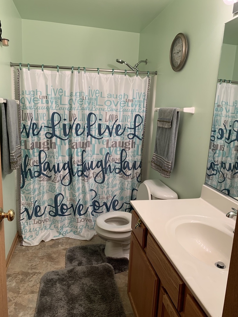 21211 Gray Hawk Drive Matteson, IL 60443 - Photo 34 of 36 a bathroom with a sink toilet and shower