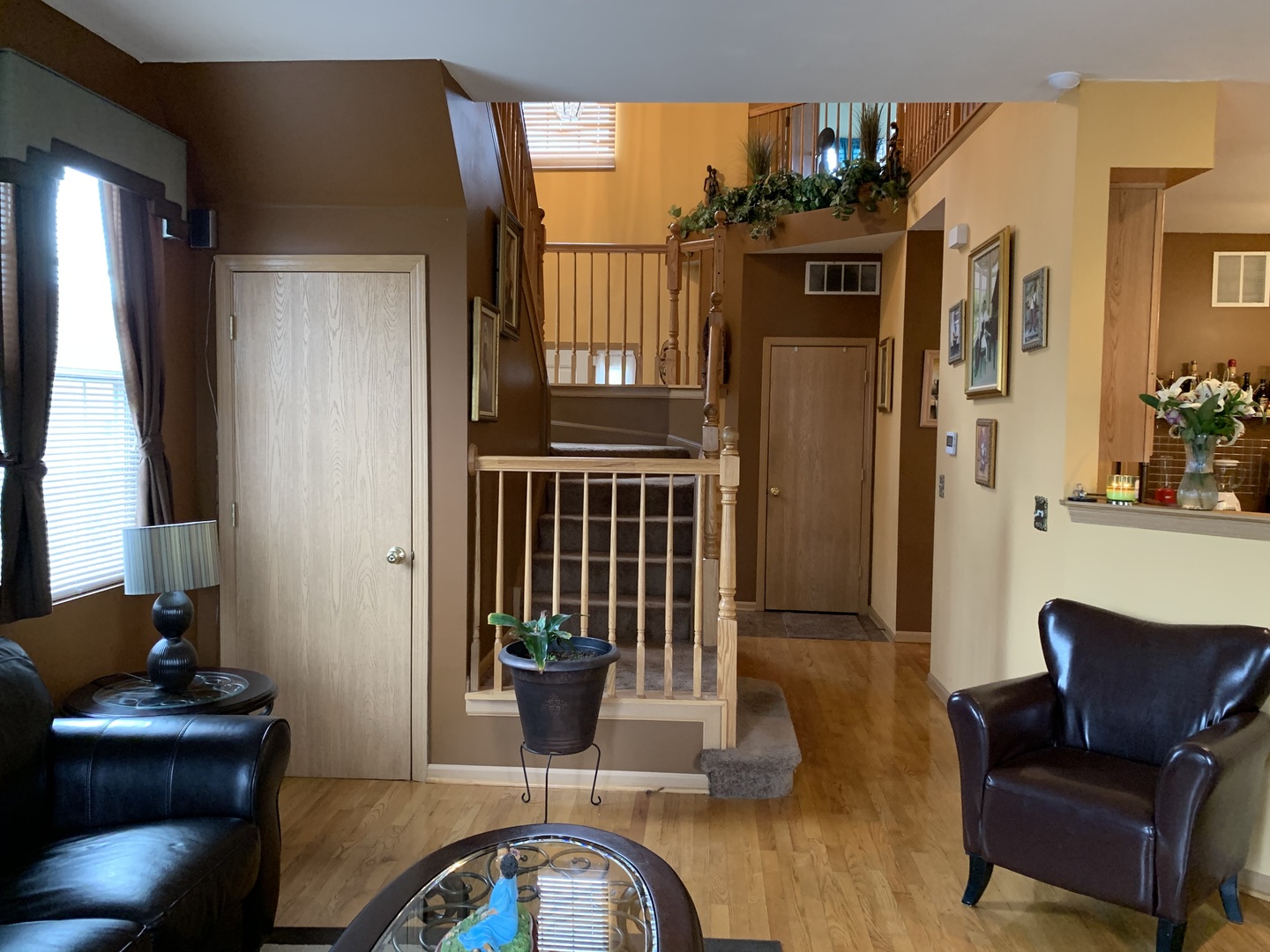 21211 Gray Hawk Drive Matteson, IL 60443 - Photo 7 of 36 a living room with furniture a flat screen tv and a window