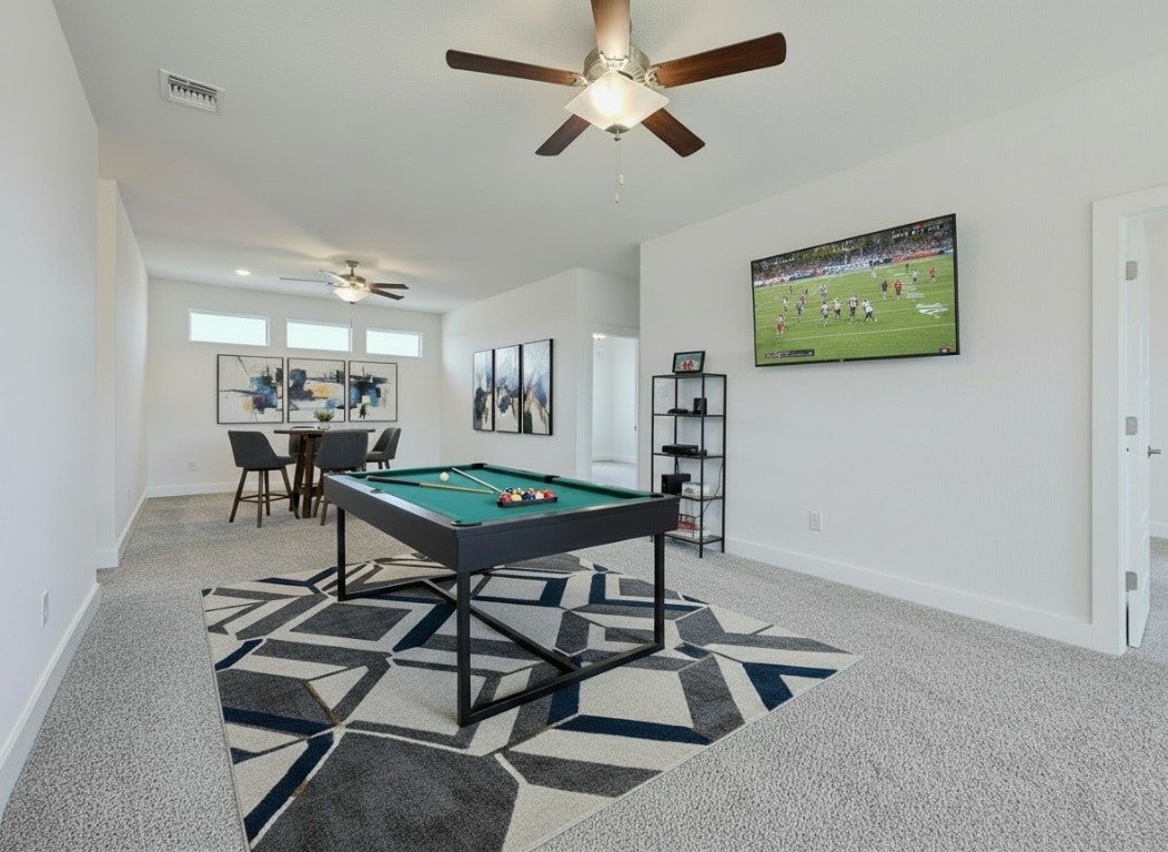 904 Arundel Road Lakeway, TX 78738 - Photo 17 of 40 a living room with furniture and a rug