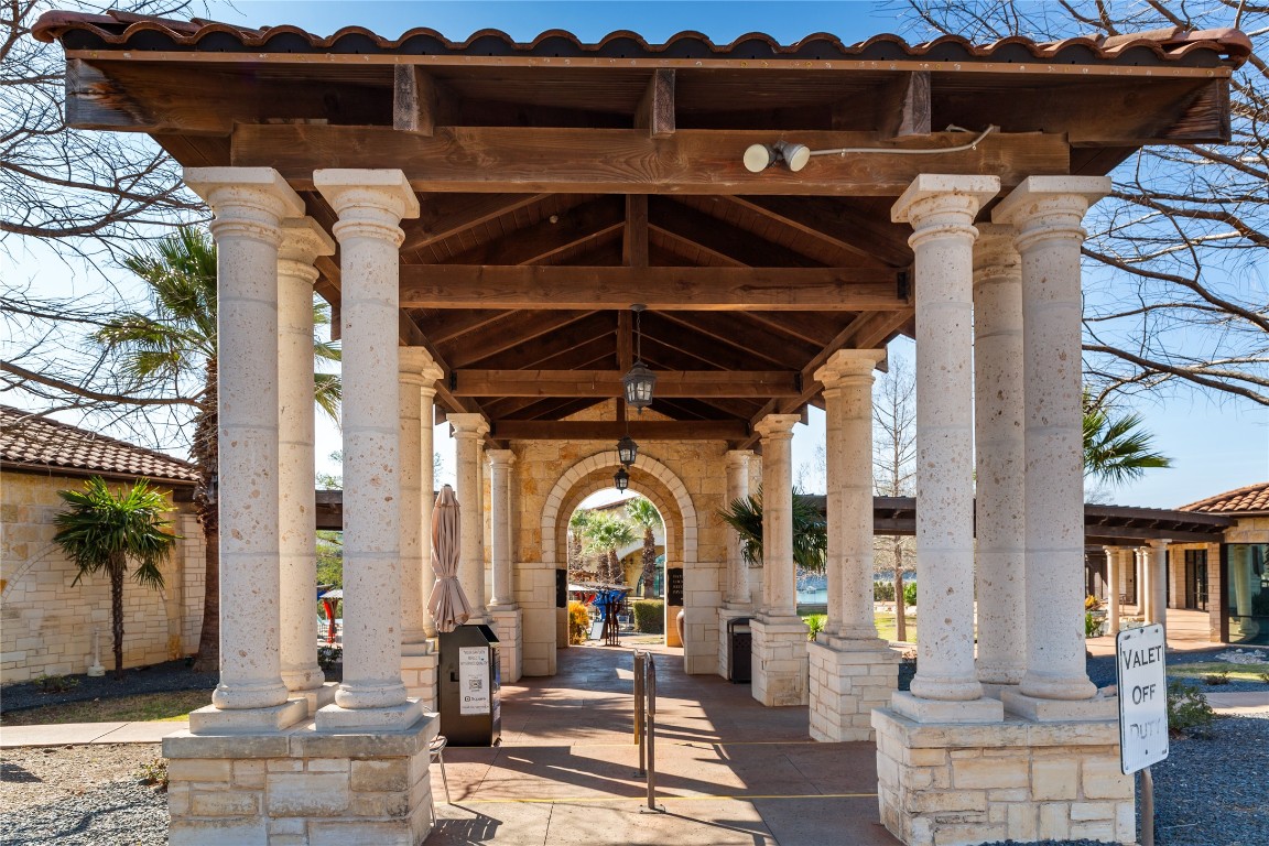 904 Arundel Road Lakeway, TX 78738 - Photo 21 of 40 a view of a patio with table and chairs