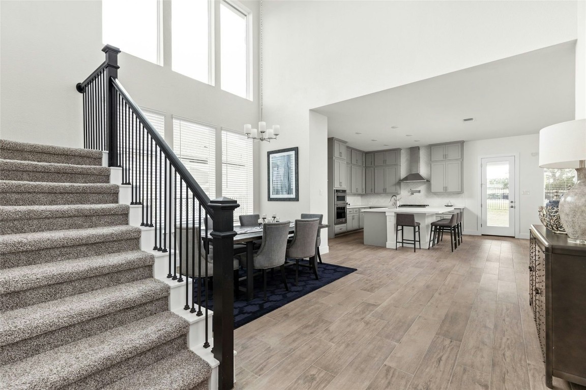 904 Arundel Road Lakeway, TX 78738 - Photo 6 of 40 a living room with furniture and wooden floor