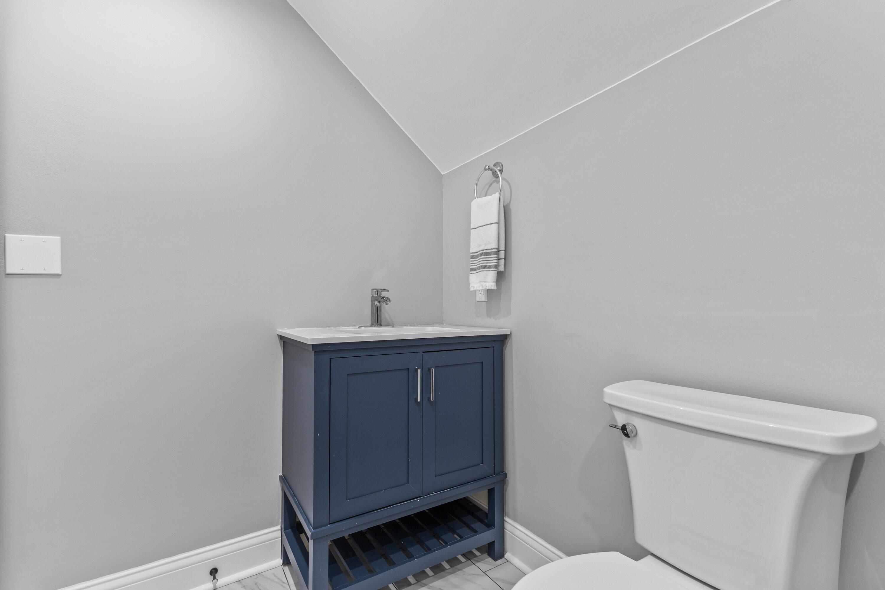 1005 Lone Tree Road Elm Grove, WI 53122 - Photo 32 of 35 half bath on upper