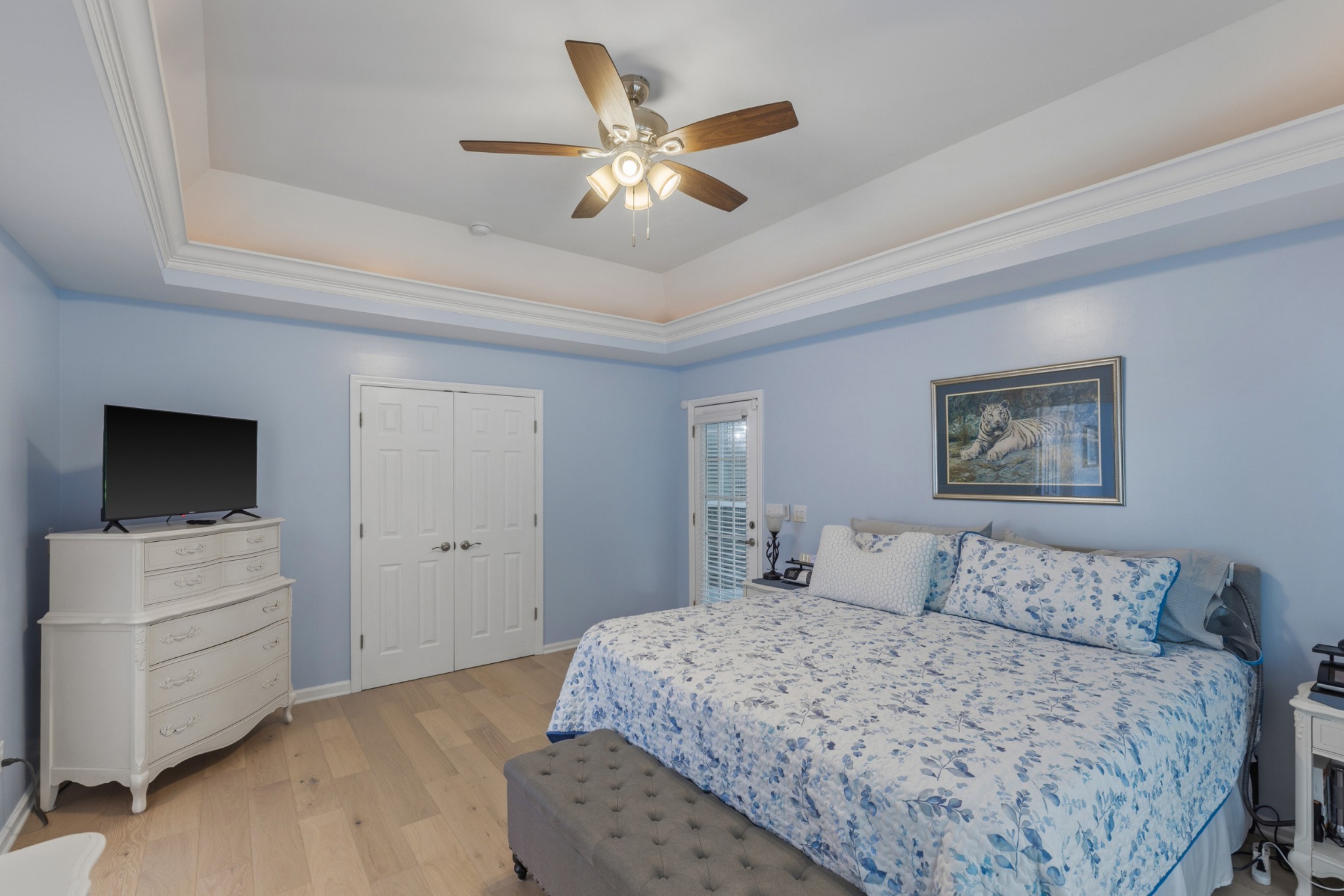 454 Campbell Hollow Road Bethpage, TN 37022 - Photo 30 of 57 a bedroom with a bed and a ceiling fan