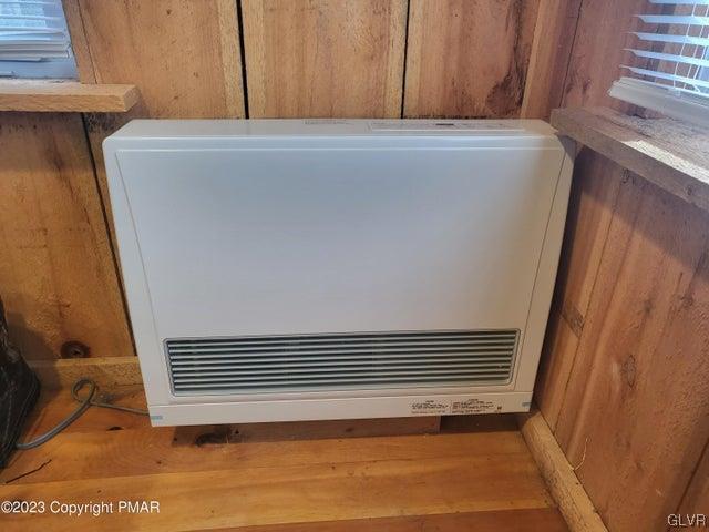 125 Ness Road Dingmans Ferry, PA 18328 - Photo 13 of 29 a view of empty room with wooden floor