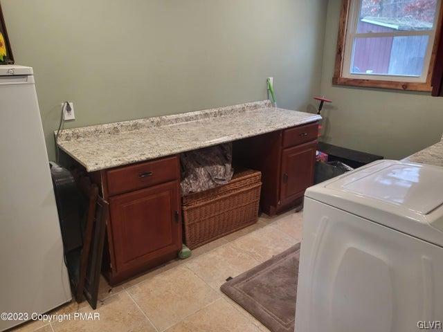 125 Ness Road Dingmans Ferry, PA 18328 - Photo 19 of 29 a utility room with dryer and washer
