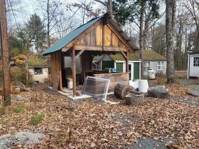 125 Ness Road Dingmans Ferry, PA 18328 - Photo 29 of 29 a front view of a house with garden