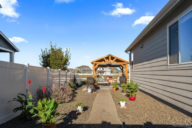 a picture of a bench in front of a window