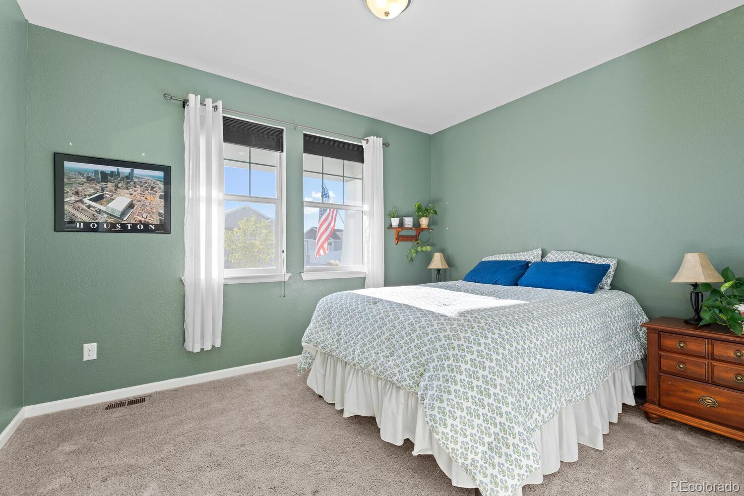 1587 Lake Point Way Severance, CO 80550 - Photo 10 of 40 a bedroom with a bed and window