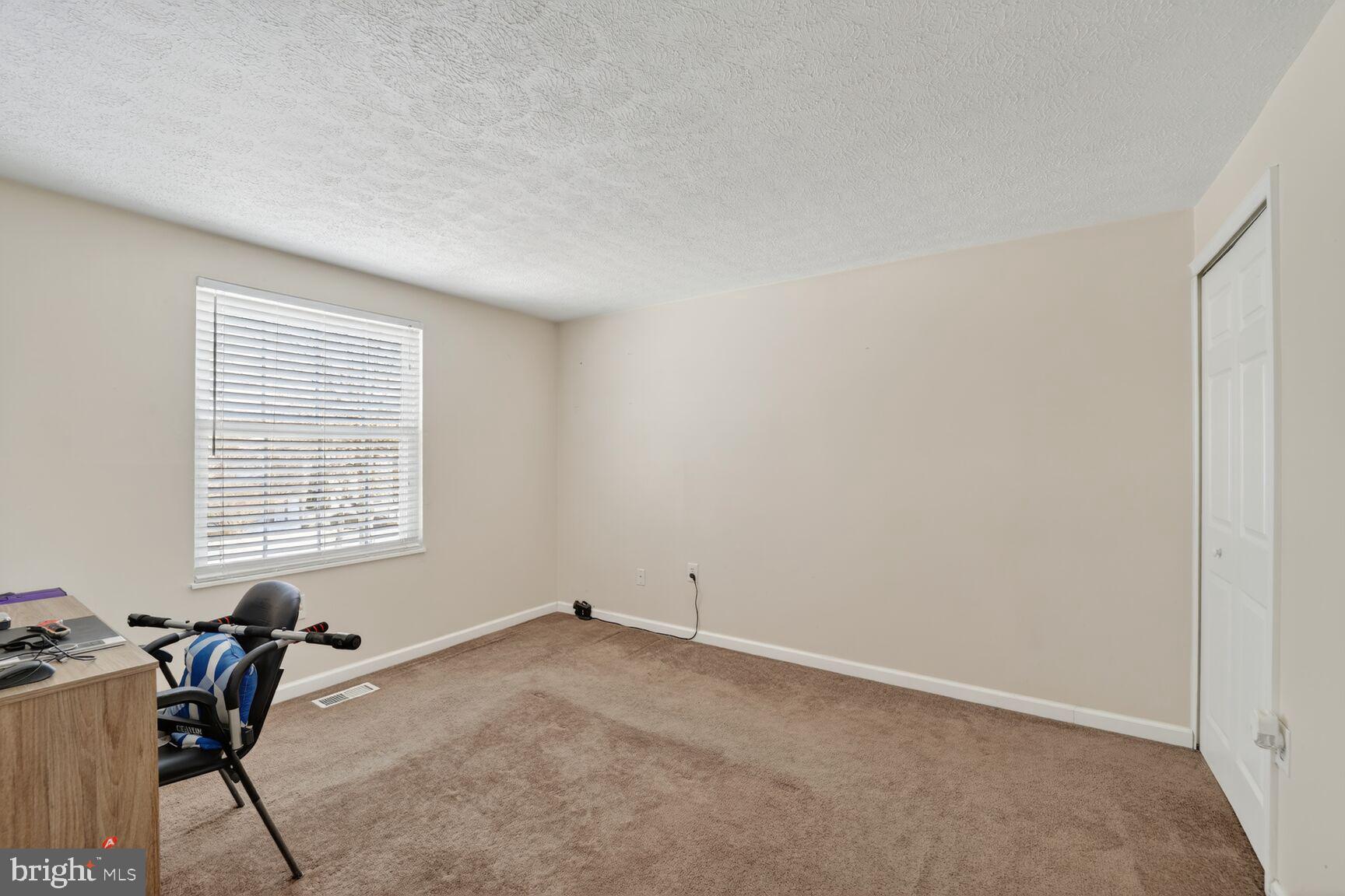 12611 Windbrook Drive Clinton, MD 20735 - Photo 16 of 32 a view of a room with a window